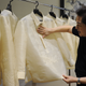 This photo taken on November 12, 2015 shows Filipino designer Paul Cabral explaining how he designed the "barong" or formal shirts that Asia-Pacific Economic Cooperation (APEC) leaders will wear during the summit this week in Manila. The twenty-two leaders of the Asia Pacific Economic Cooperation (APEC) will wear the "barong tagalog", the Philippines' formal shirt, with each garment custom-embroidered with their country's symbols. Cabral is hoping to buck the trend with his creations, which took four months to design and sew painstakingly by hand.